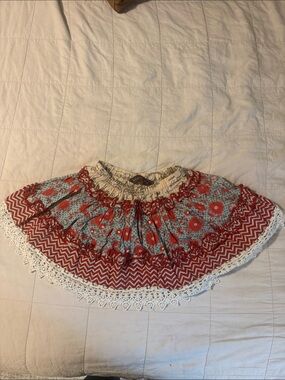 Mustard Pie Skirt with Green Script and Red & Blue designs. Lace hem. Size 6X